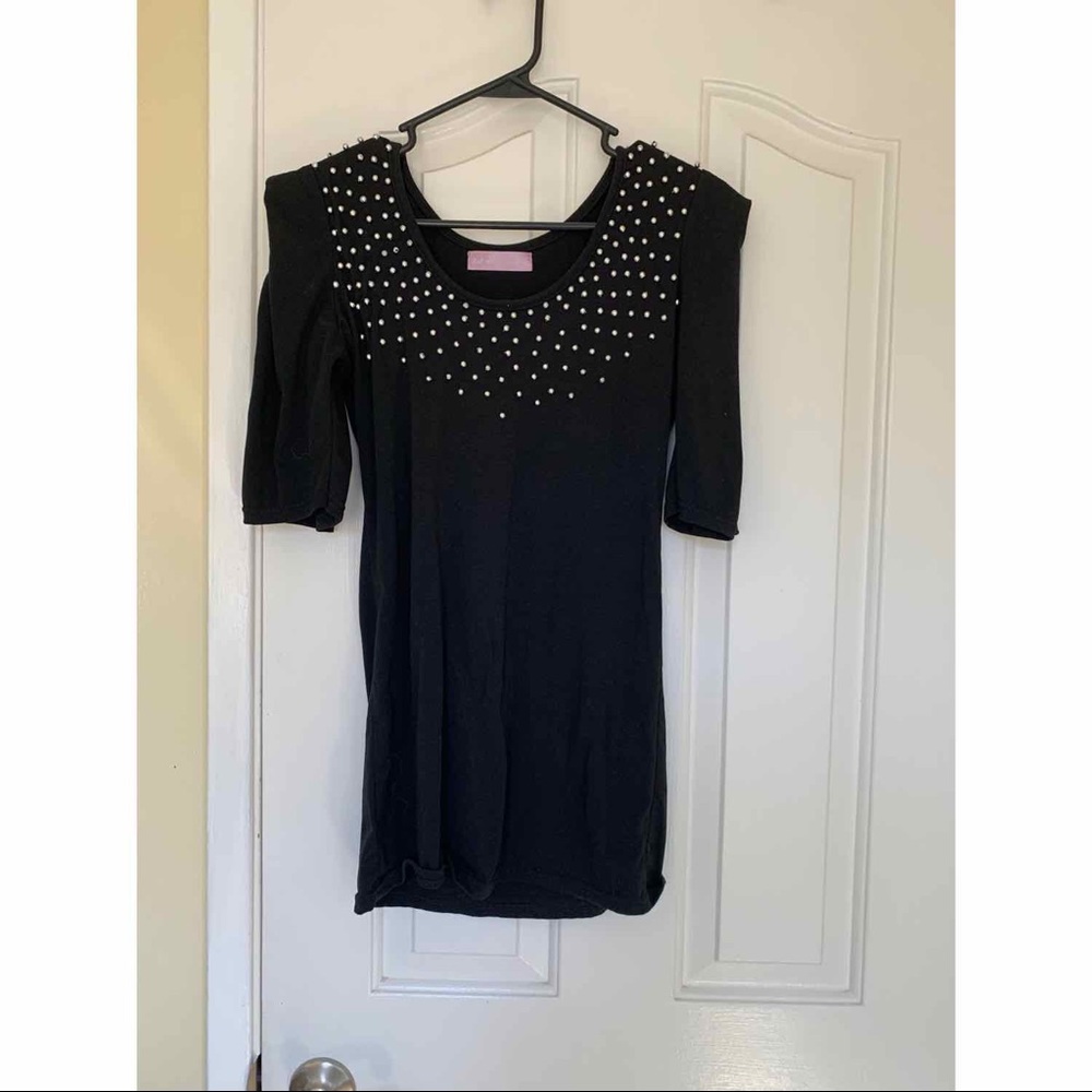 Black shirt with beads on top by The Limited in Medium